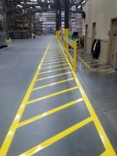 Yellow Striping on Warehouse Floor